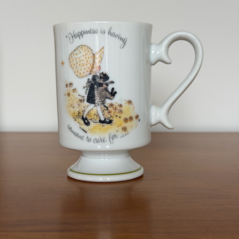 Holly Hobbie Pedestal Coffee Mug -“Happiness Is Having Someone To Care For”